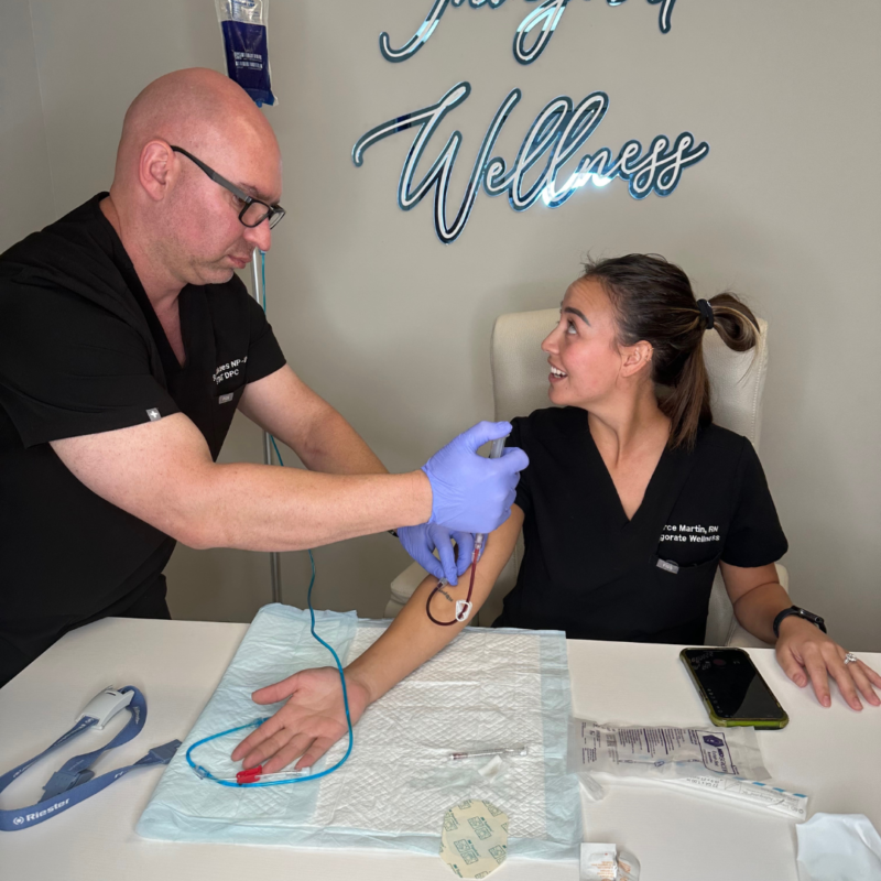 invigorate wellness medical of tampa bay's provider administering a methylene blue iv to a woman