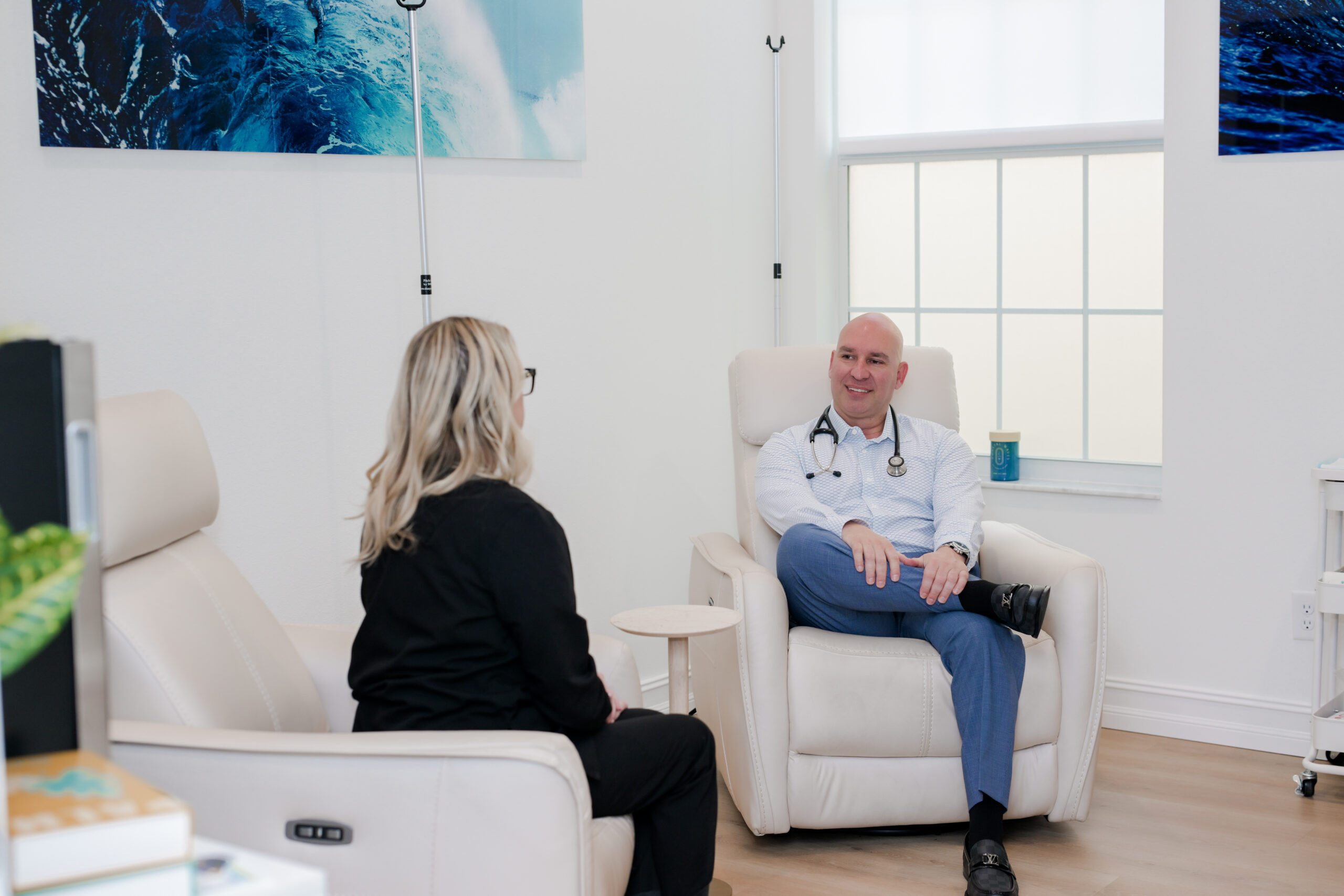 woman discussing medical options in direct primary care office